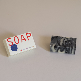 Camp Soap Bar Next to Box
