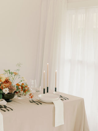 Monterey Taper Candle Set in Clay on Table with Flowers and Place Setting