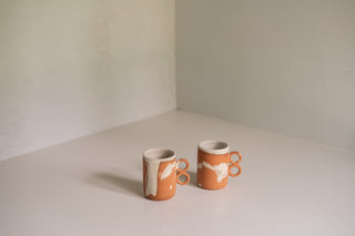 Nichols Mugs in Terracotta Splatter Side by Side 