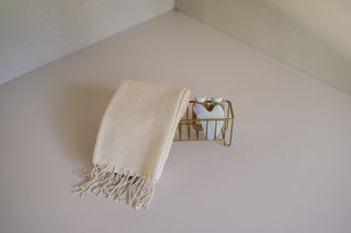 Akita Narrow Wire Basket with Amasra Hand Towel, Two Toiletry Jars, and Gua Sha