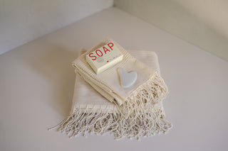 Amasra Bath and Hand Towels in Stack with Soap and Gua Sha