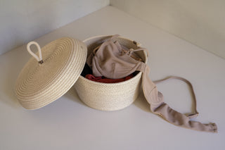 Navarre Lidded Loop Basket in Large with Lid Open and Swimsuits Inside