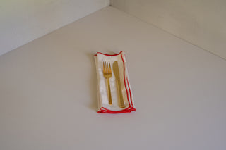 Milia Napkin Set Stacked in Leche with Fork and Knife
