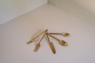 Lodhi Flatware Set Stacked in Curving Display