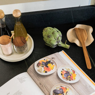 Zuni Teak Spatula on Stowe Ceramic Tray on Counter with Cookbook