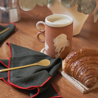 Saikai Dessert Spoon Next to Nichols Coffee Mug and Amate Dessert Tray with Croissant