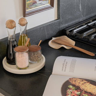 Zuni Teak Spatula on Stowe Ceramic Tray on Counter with Cookbook