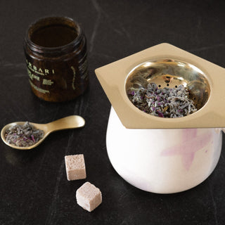 Kensington Tea Strainer Over Brea Mug with Yaizu Brass Scoop, Loose Leaf Tea, and Teaspressa Sugar Cubes 