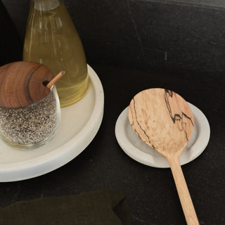 Oaxaca Spoon Rest on Counter with Tikal Cooking Spoon in Pixi Next to Olive Oil and Black Pepper