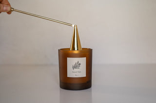 Slope Candle Douter Resting On Santal Noir Candle